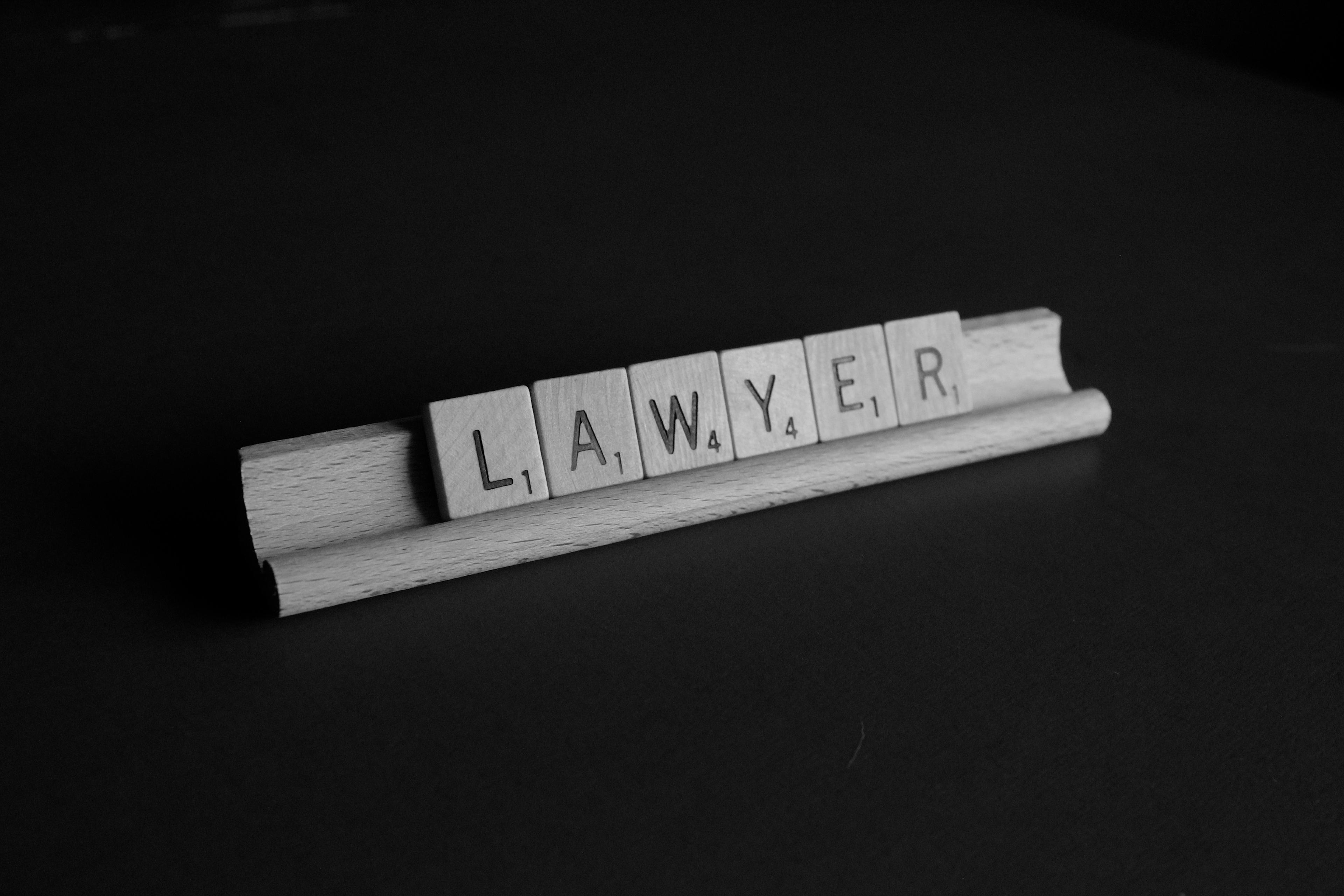 Stack of contract documents on a desk