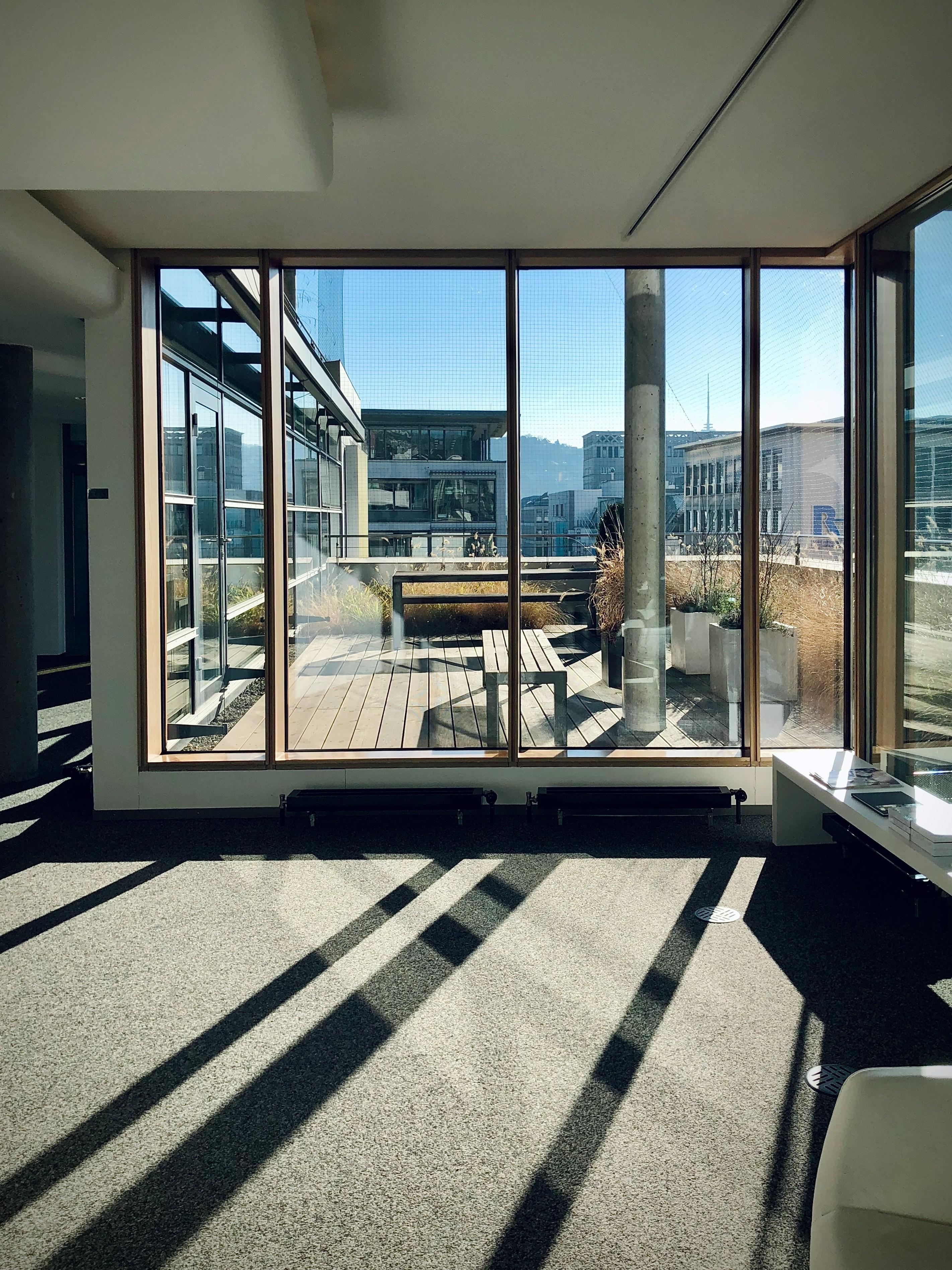 Modern office interior with city skyline through the windows
